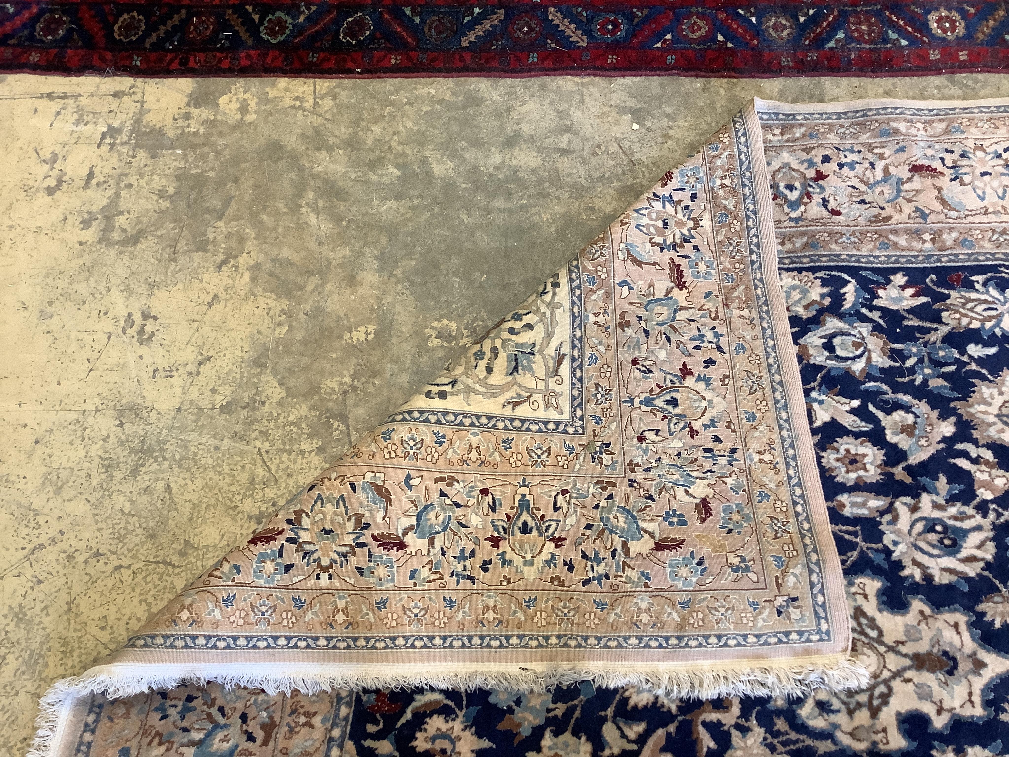 A Nain blue ground carpet, 277 x 174cm. Condition - fair to good